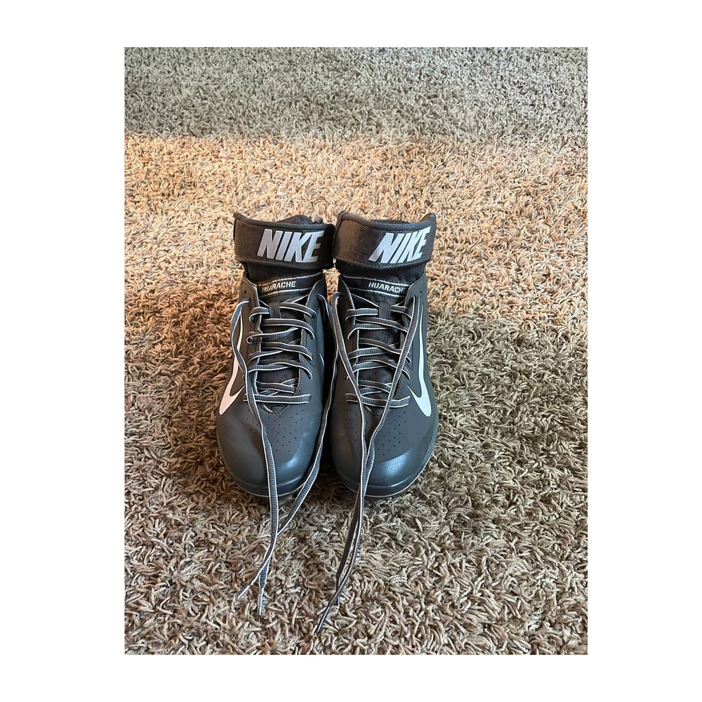 Nike Huarache cleats with metal spikes